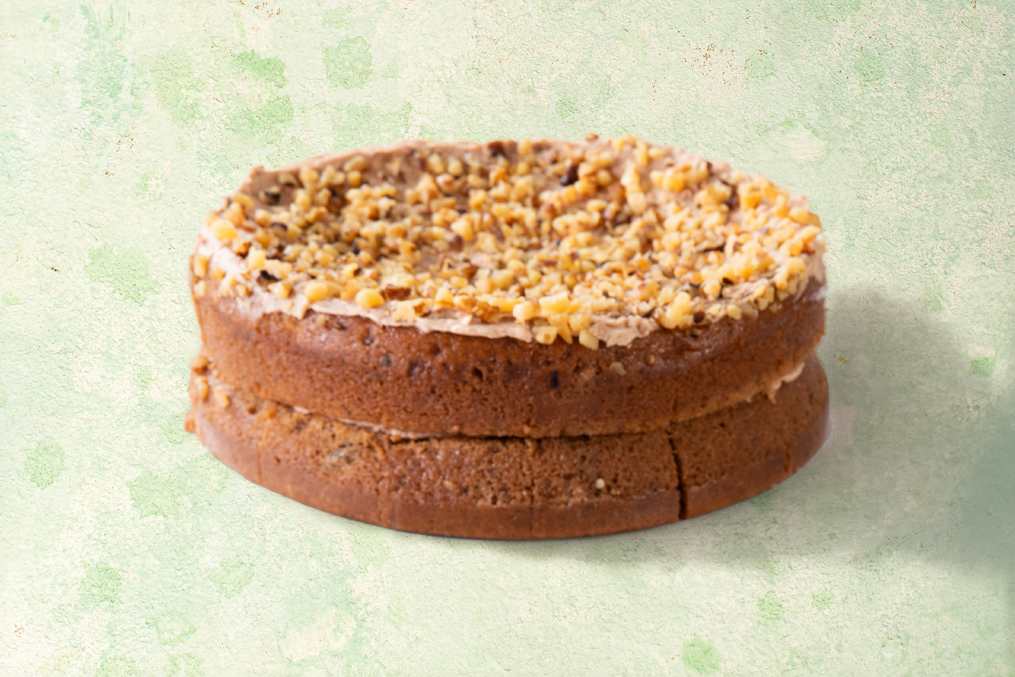VG-Banana-and-Cinnamon-Cake Vegan banana and cinnamon cake with chopped walnut topping