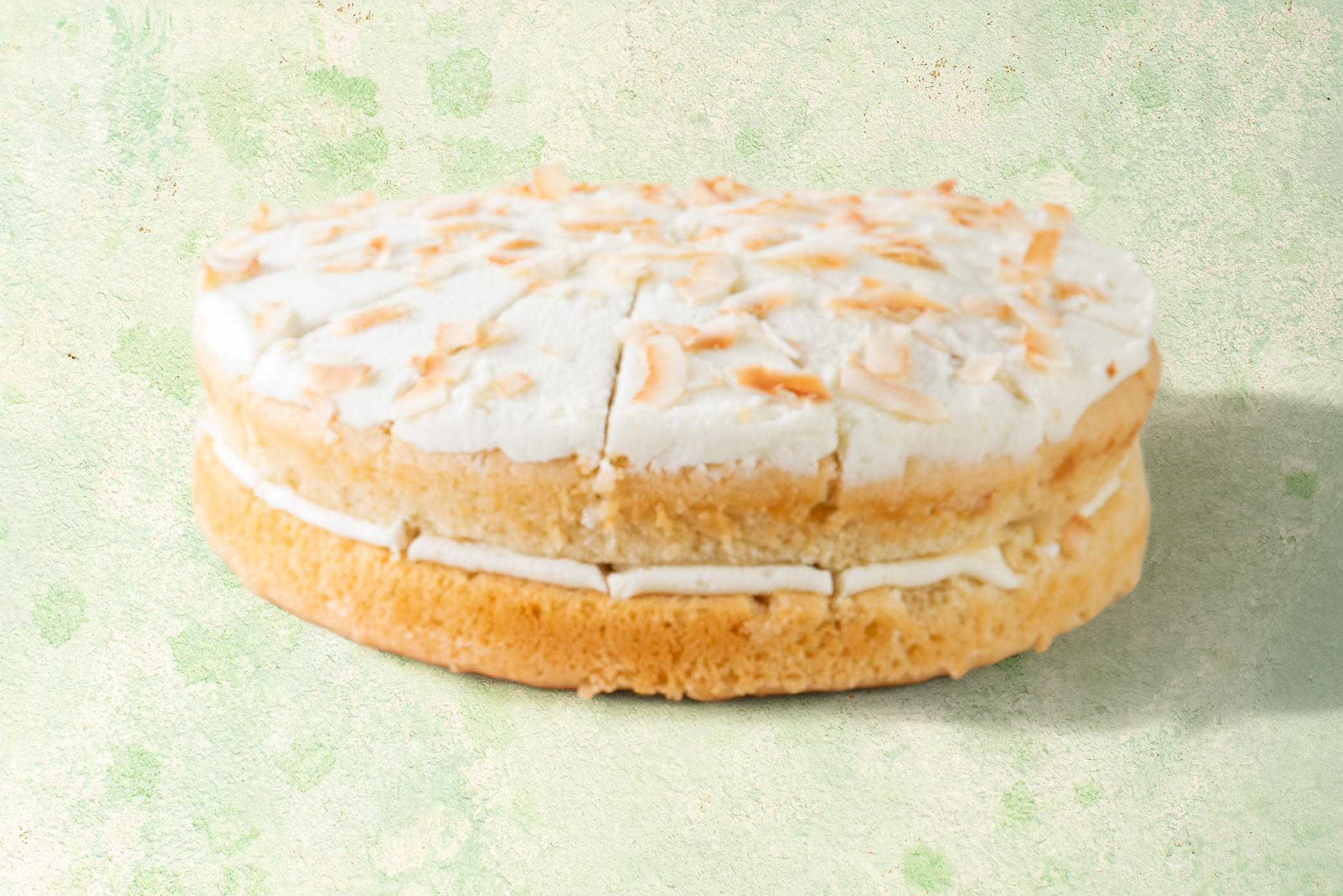 VG-Lime-and-Coconut-Cake Vegan lime and coconut cake with coconut topping.